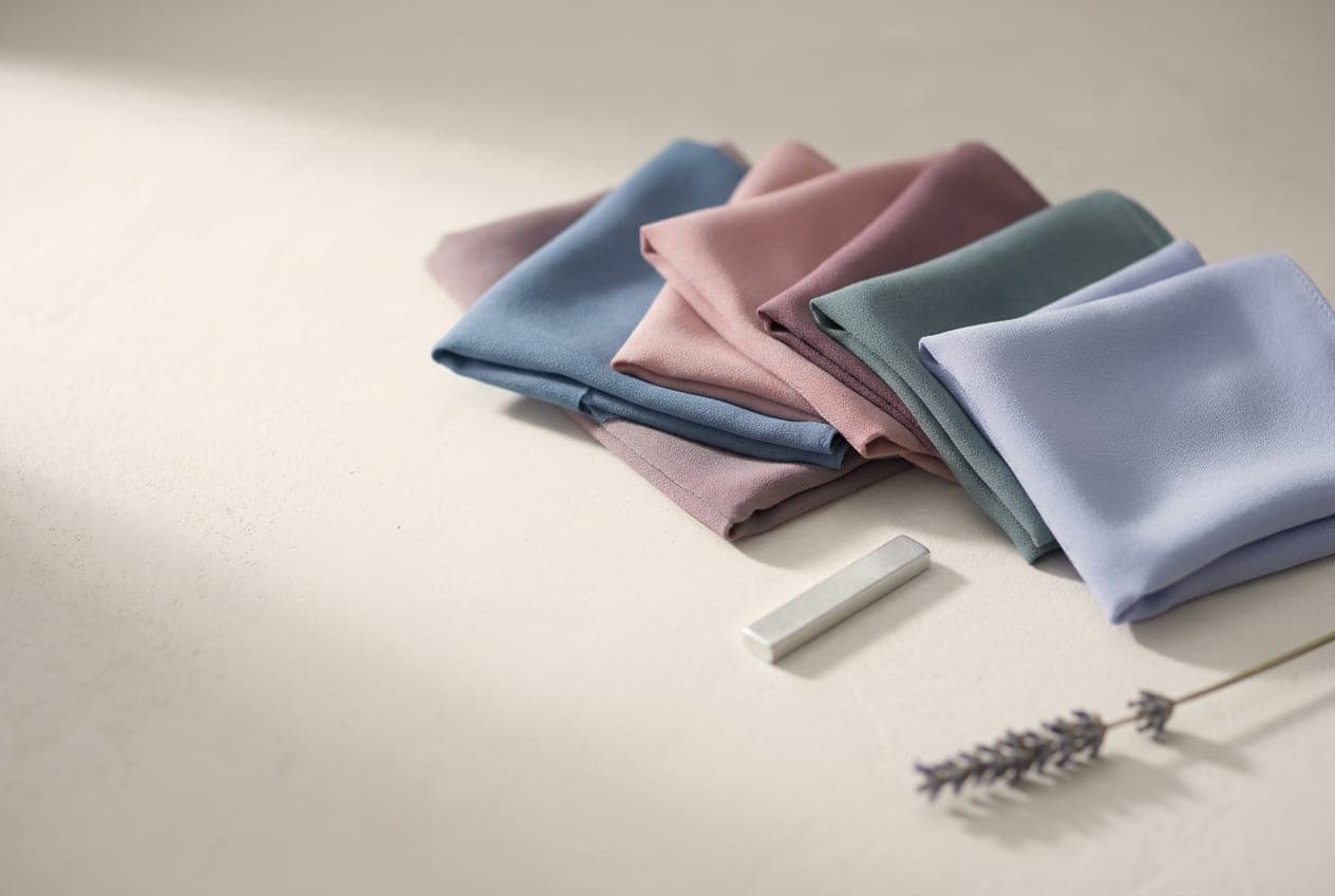 Folded squares of fabric in the Summer palette